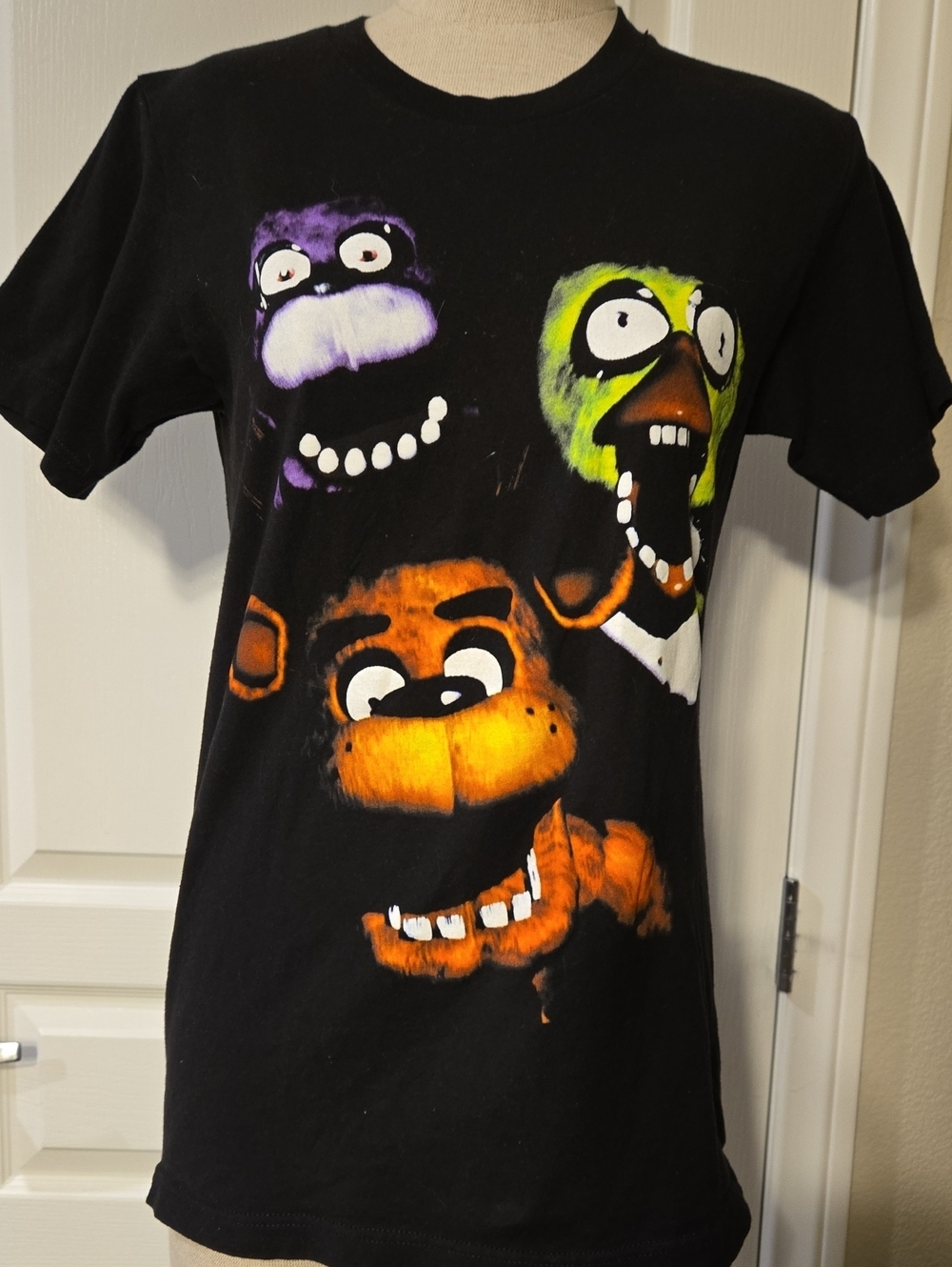 Five Nights At Freddy's Black Graphic Tee with Colorful Monster Faces